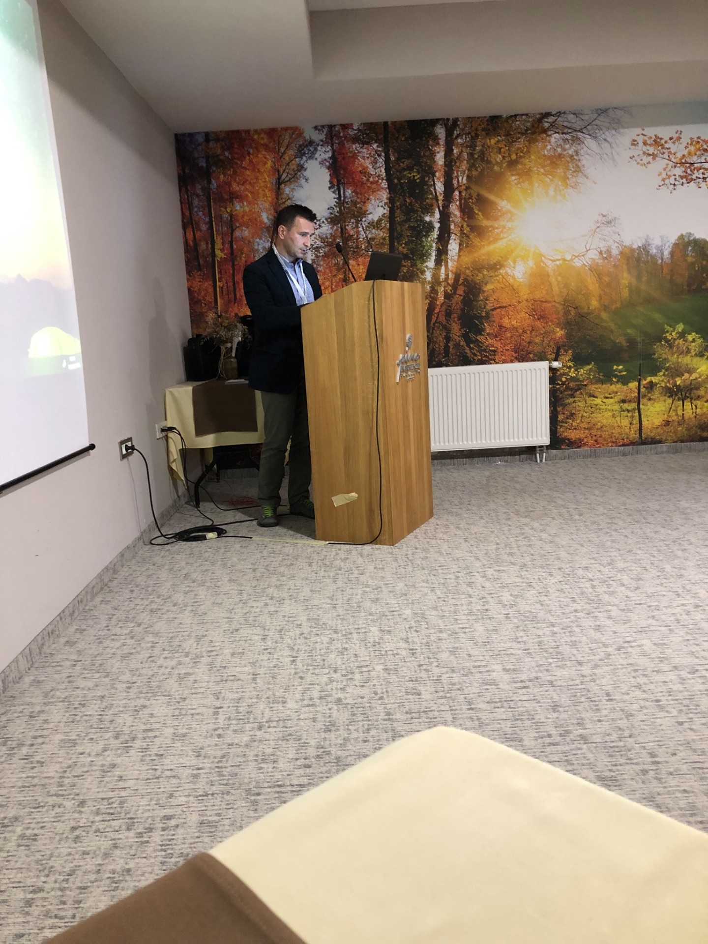 Speaker at podium at 4th BTSC
